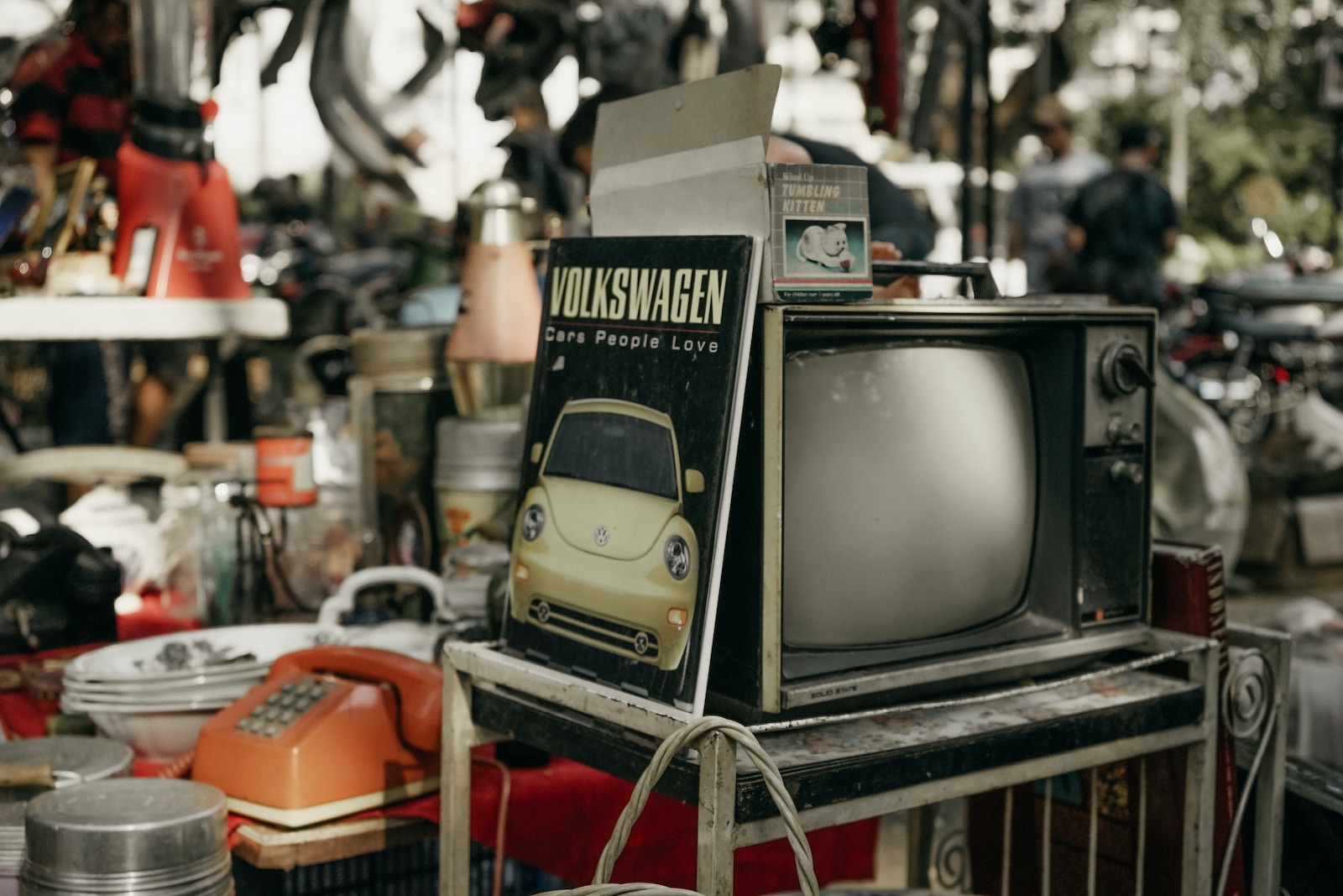 vintage black CRT TV on rack